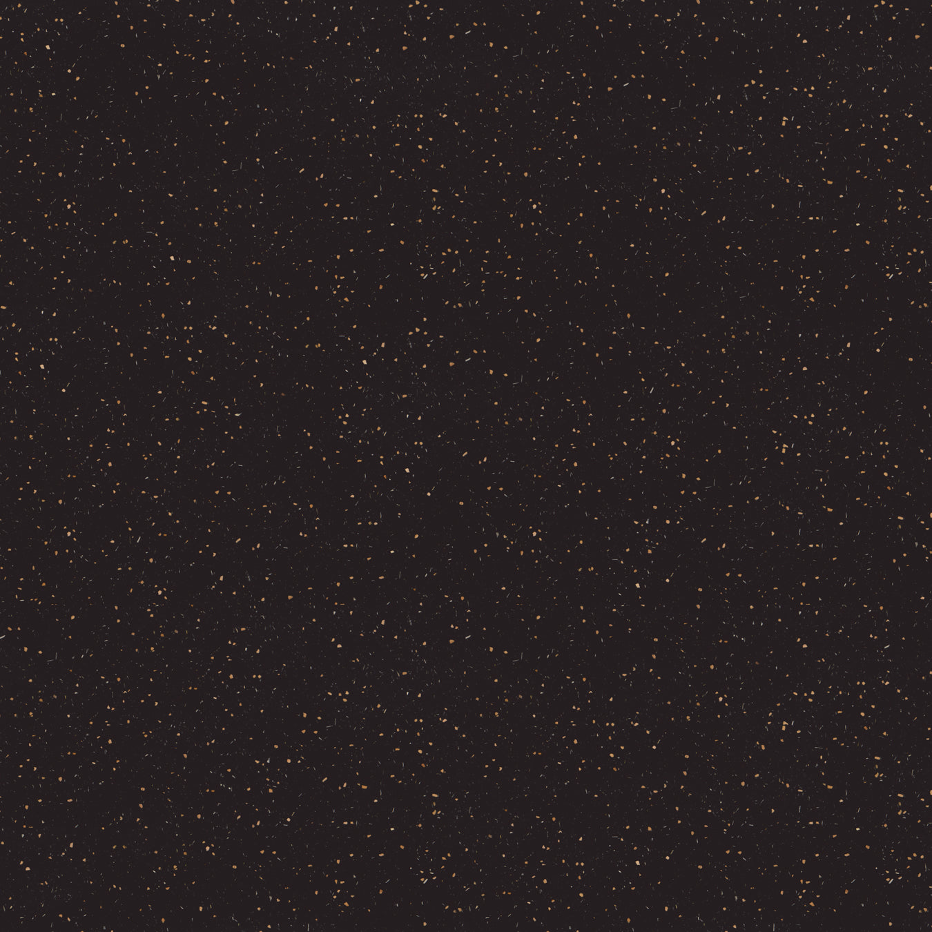 Surface detail of warm black coloured Elenite solid surface with walnut shell particles and bamboo fibre.