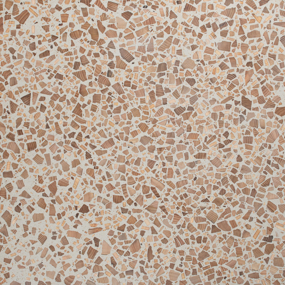 Surface detail of Foresso timber terrazzo with a grey binder and Oak wood chips.