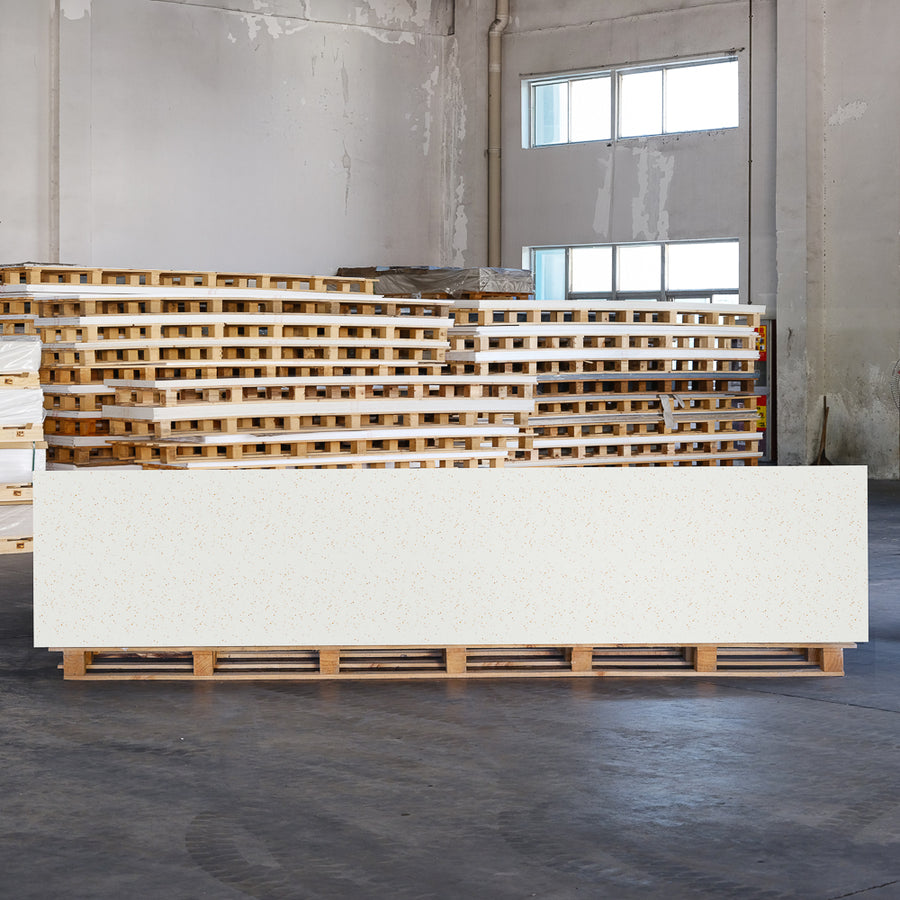 Full size Ruskin White solid surface panel in a warm black tone with fine walnut shell and bamboo fibre speckling.