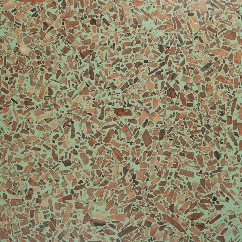 Surface detail of Foresso timber terrazzo with a green binder and London Plane wood chips.
